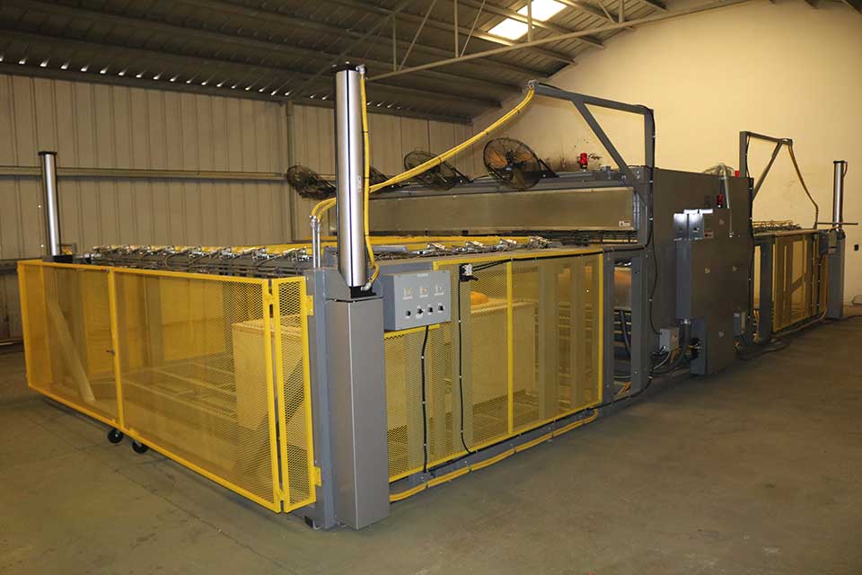 bv a dual station for high production vacuum forming machines