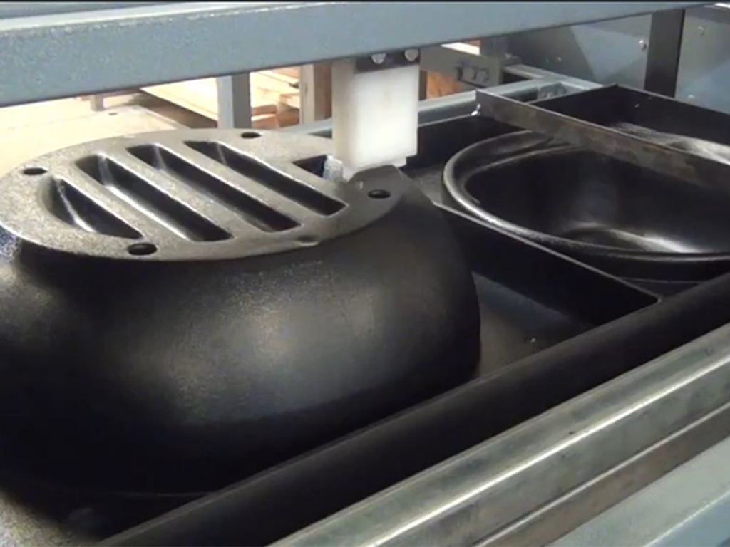 vacuum forming machines used in custom plastic manufacturing with tight tolerances