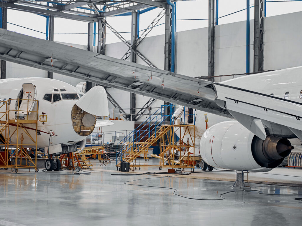 vacuum forming machines used to create plastic parts for airplane manufacturers